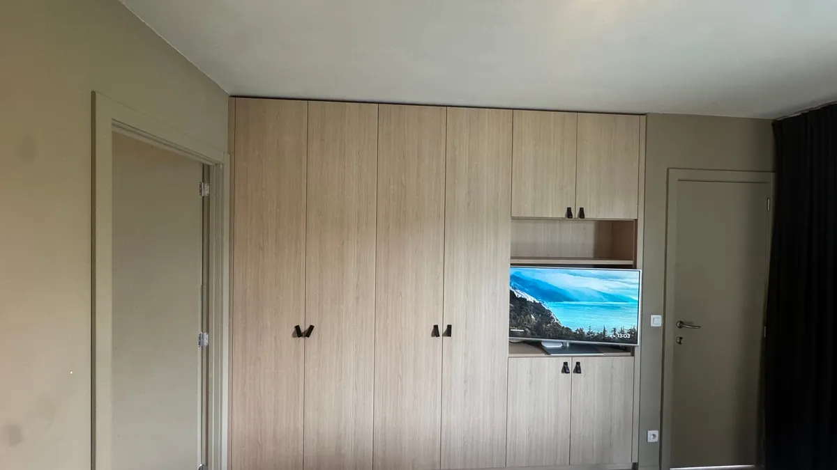 Double bedroom with a full-width built-in oak wardrobe