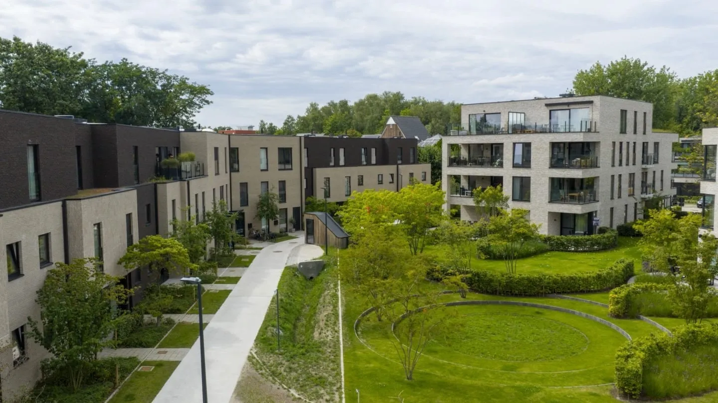 Aerial view of the Maple Garden residential complex and its landscaped communal garden in Ghent